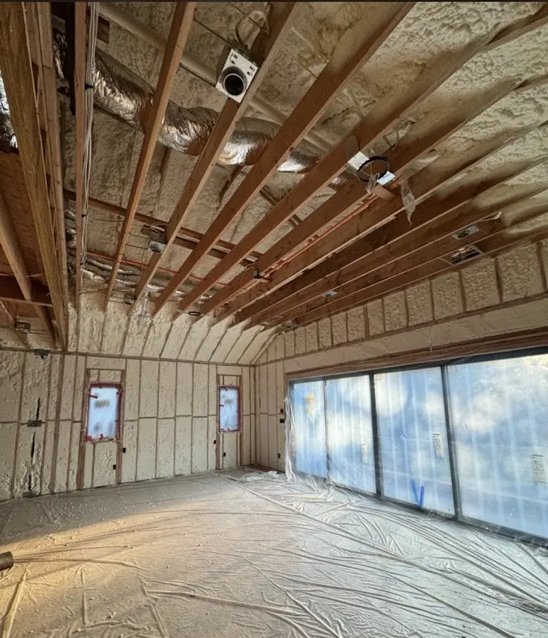 Interior walls and ceiling insulated with spray foam during new construction in Dolton